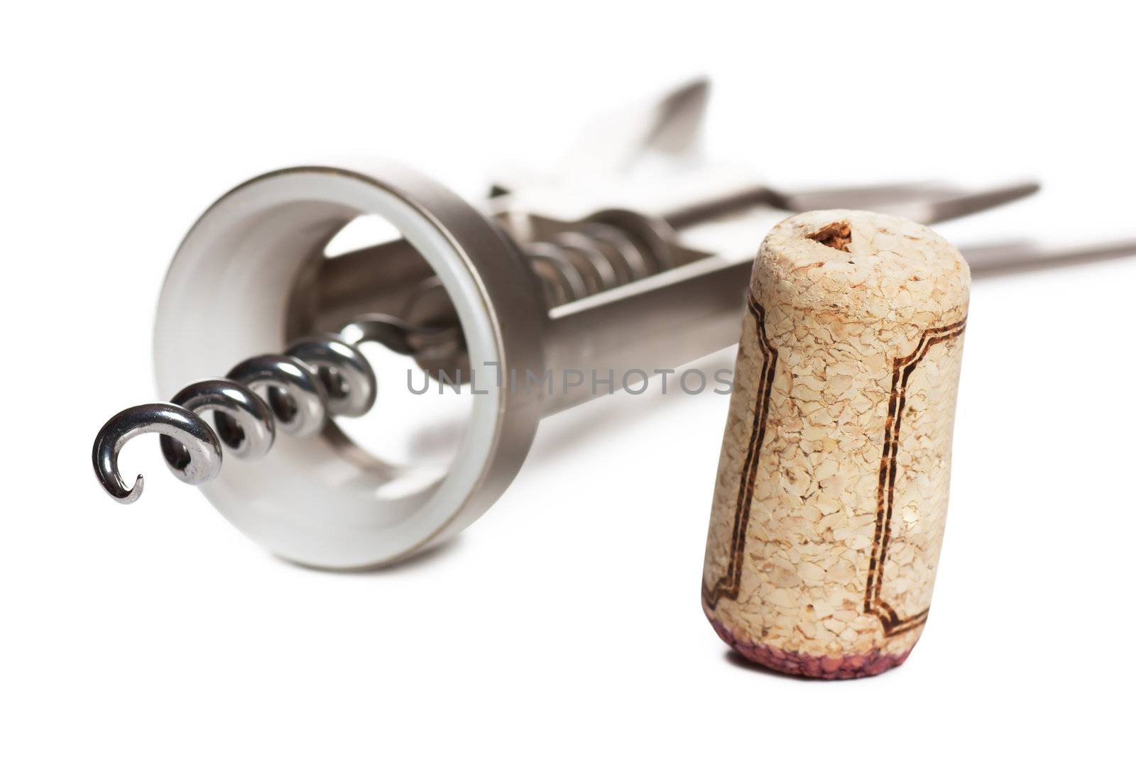 Corkscrew with extracted cork isolated on white