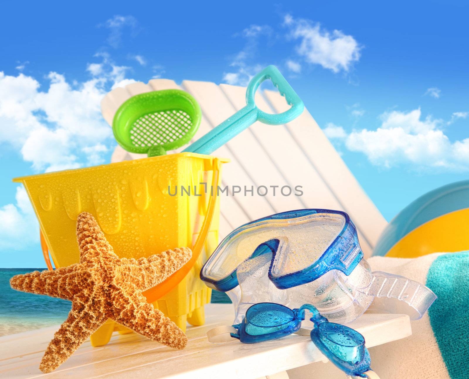 Closeup of children's beach toys  by Sandralise