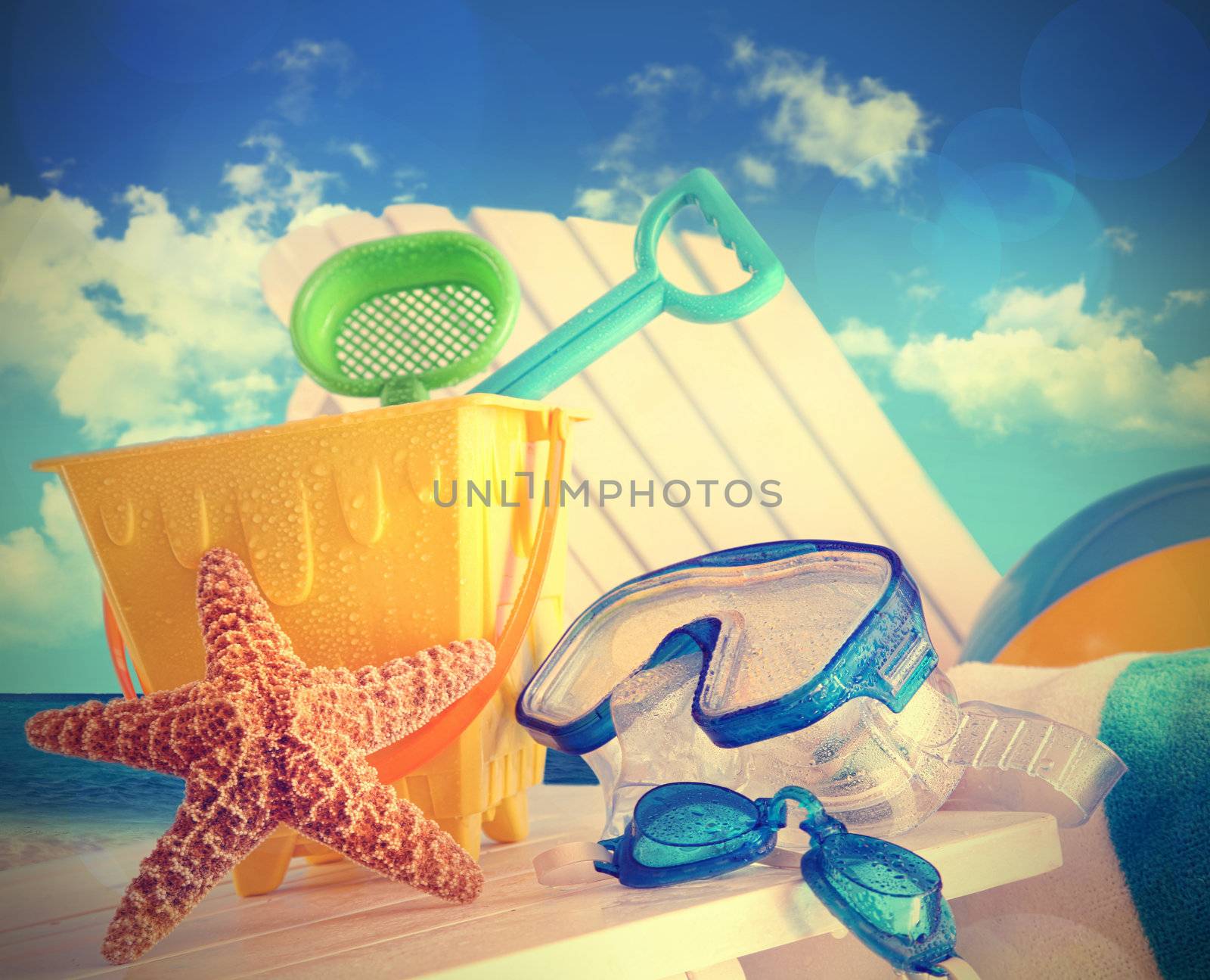 Closeup of children's beach toys at the beach