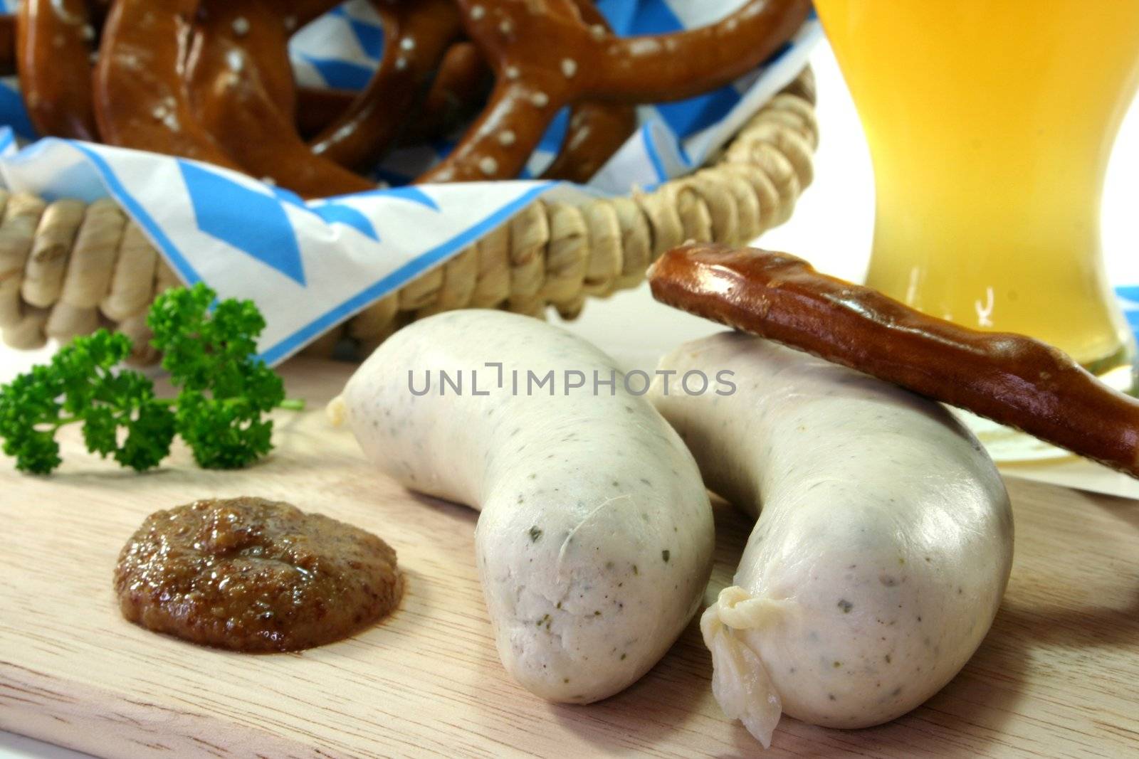 veal sausage with sweet mustard and pretzels