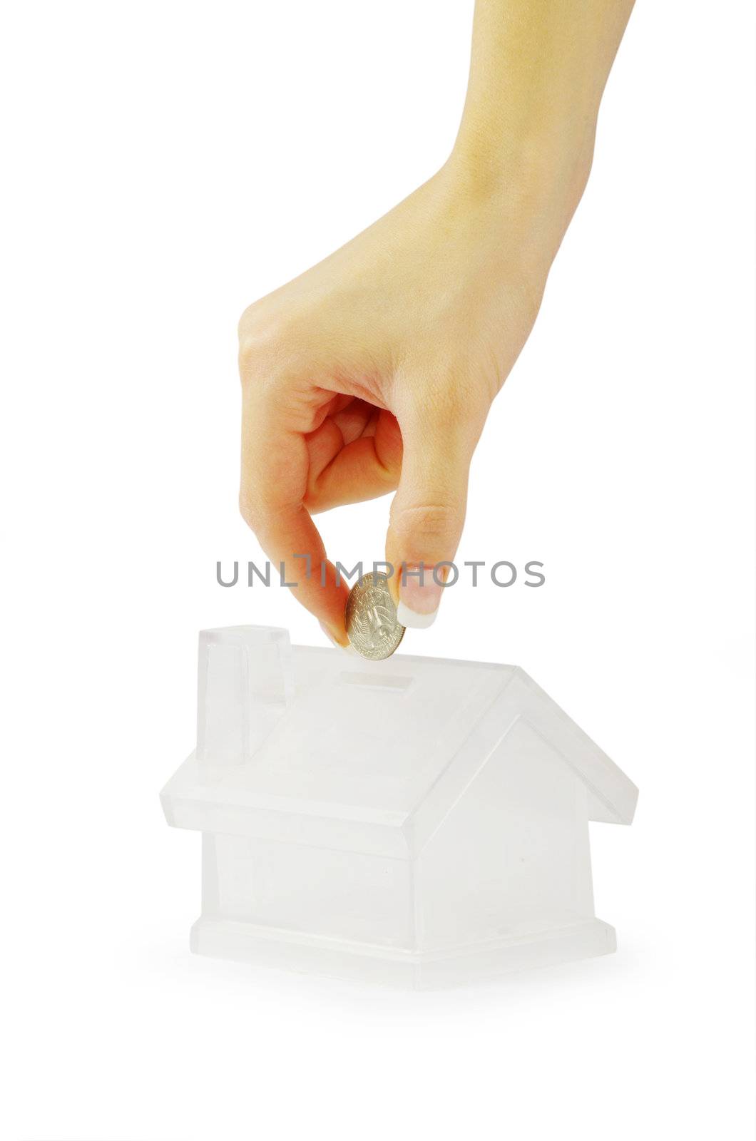 Hand with coin and house bank isolated on white background