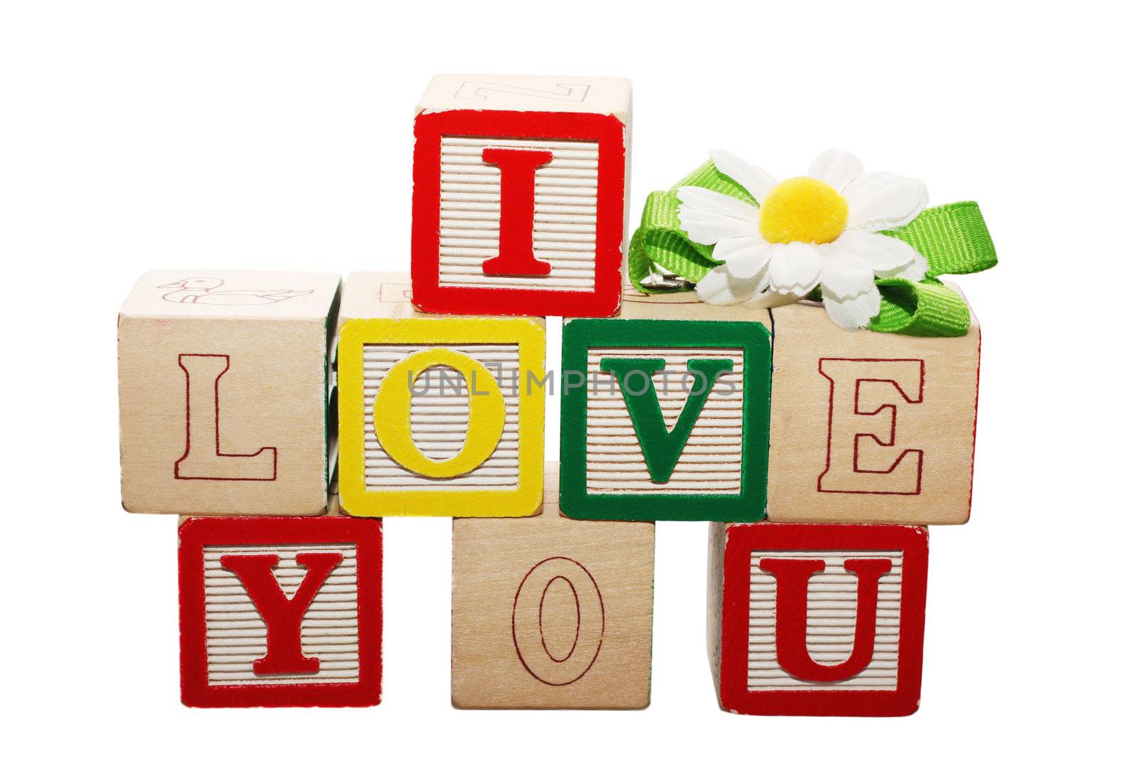 Phrase I LOVE YOU formed from wooden letter blocks by dacasdo