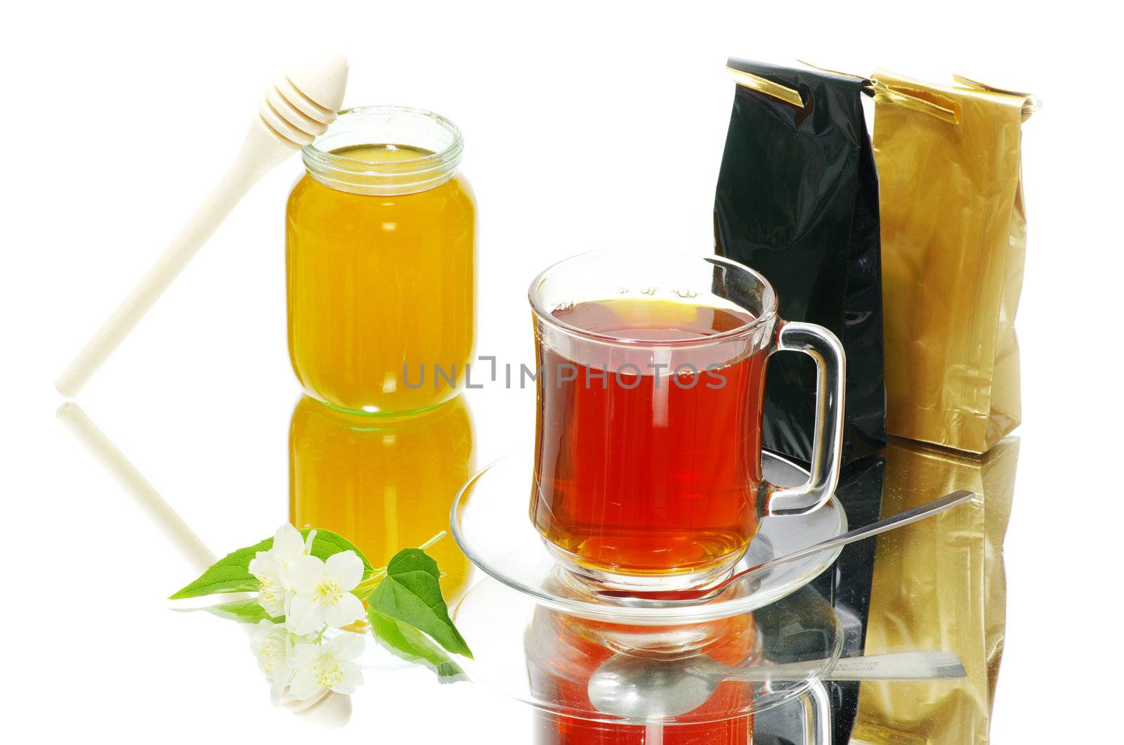 Tea being poured into glass tea cup