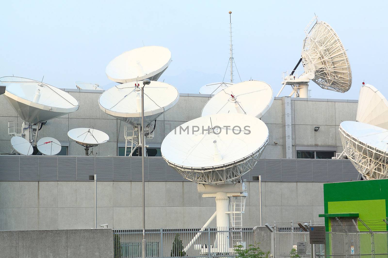 Satellite Communications Dishes on top of TV Station 