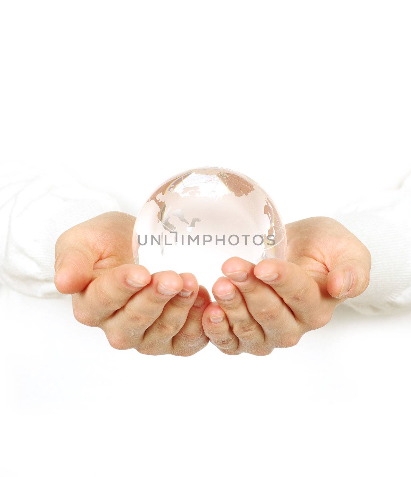 Hand holdings a globe on a white