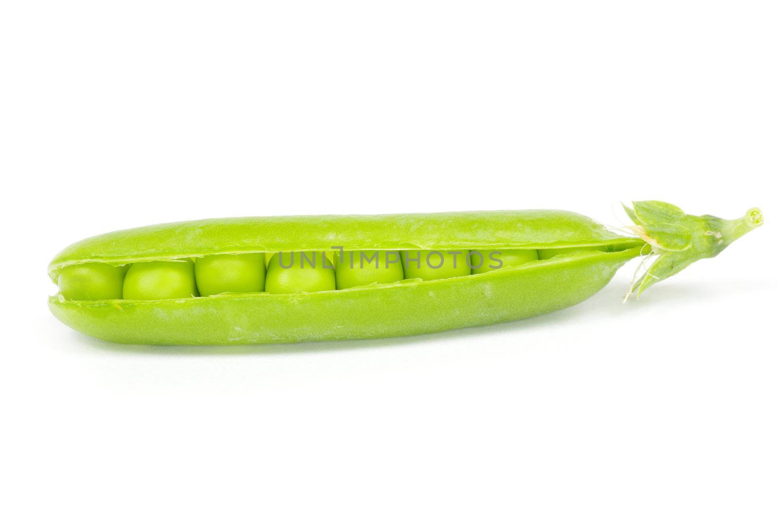 green peas vegetable closeup isolated on white