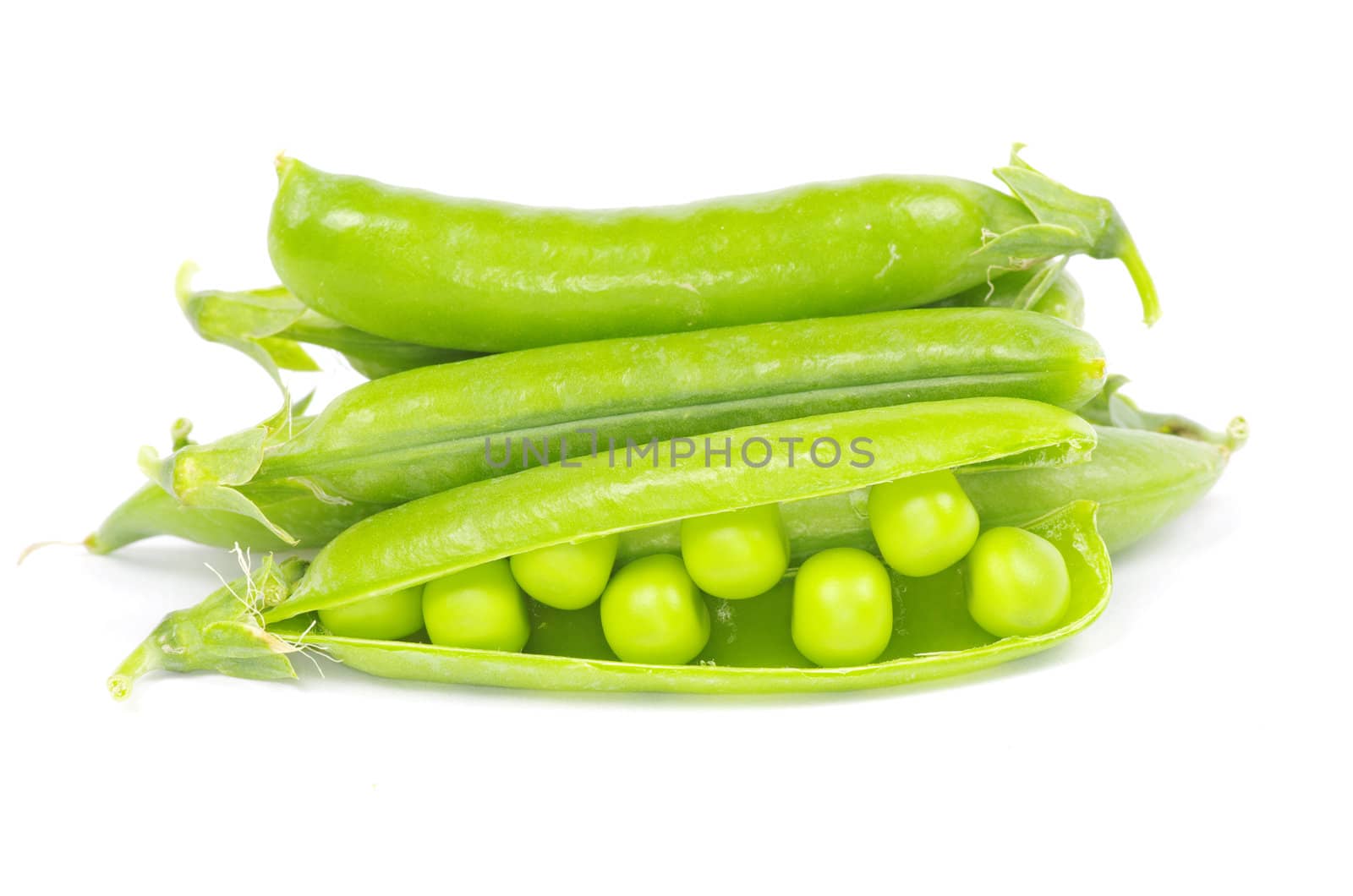 fresh green peas isolated on a white background