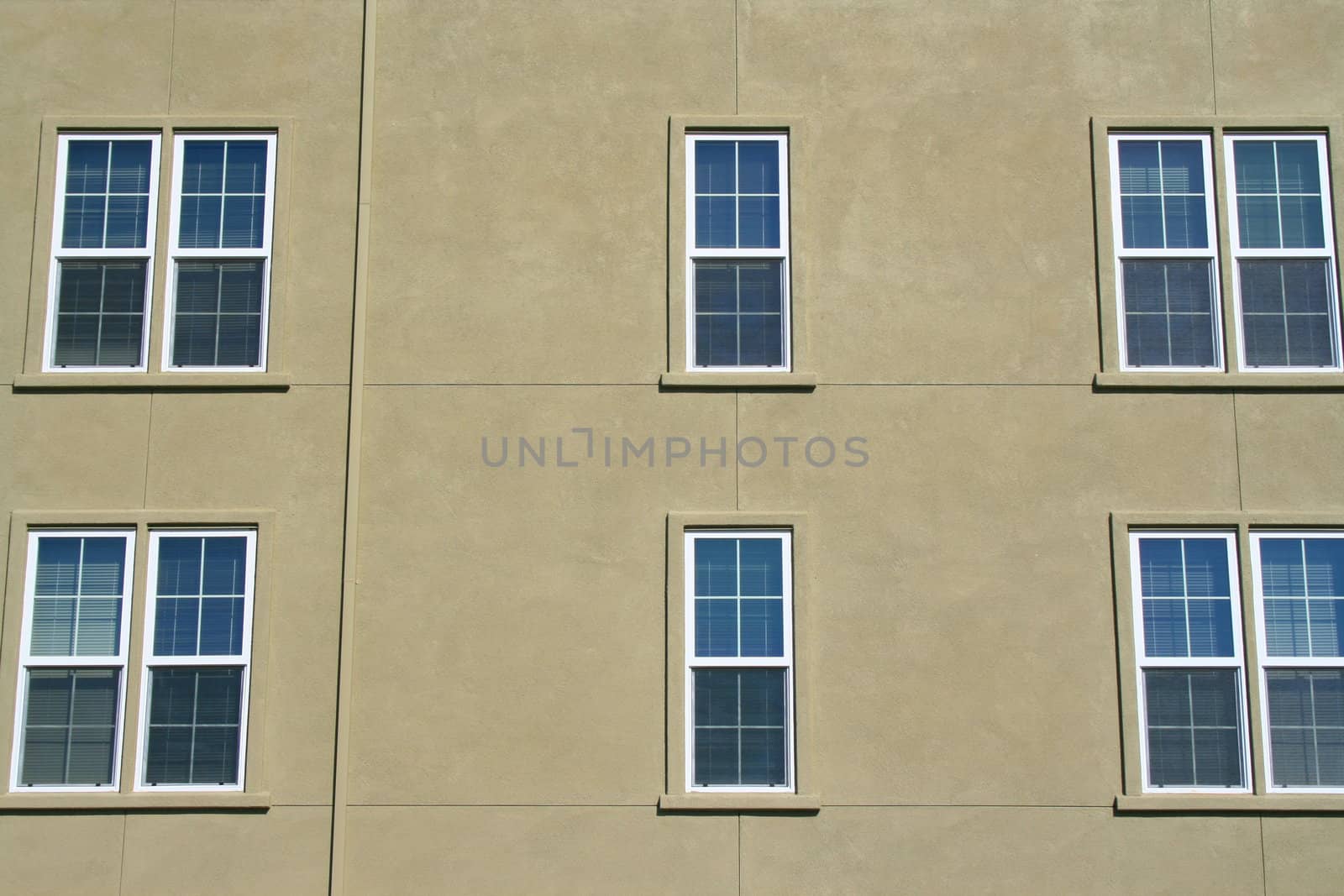 Close up of the windows of a building.
