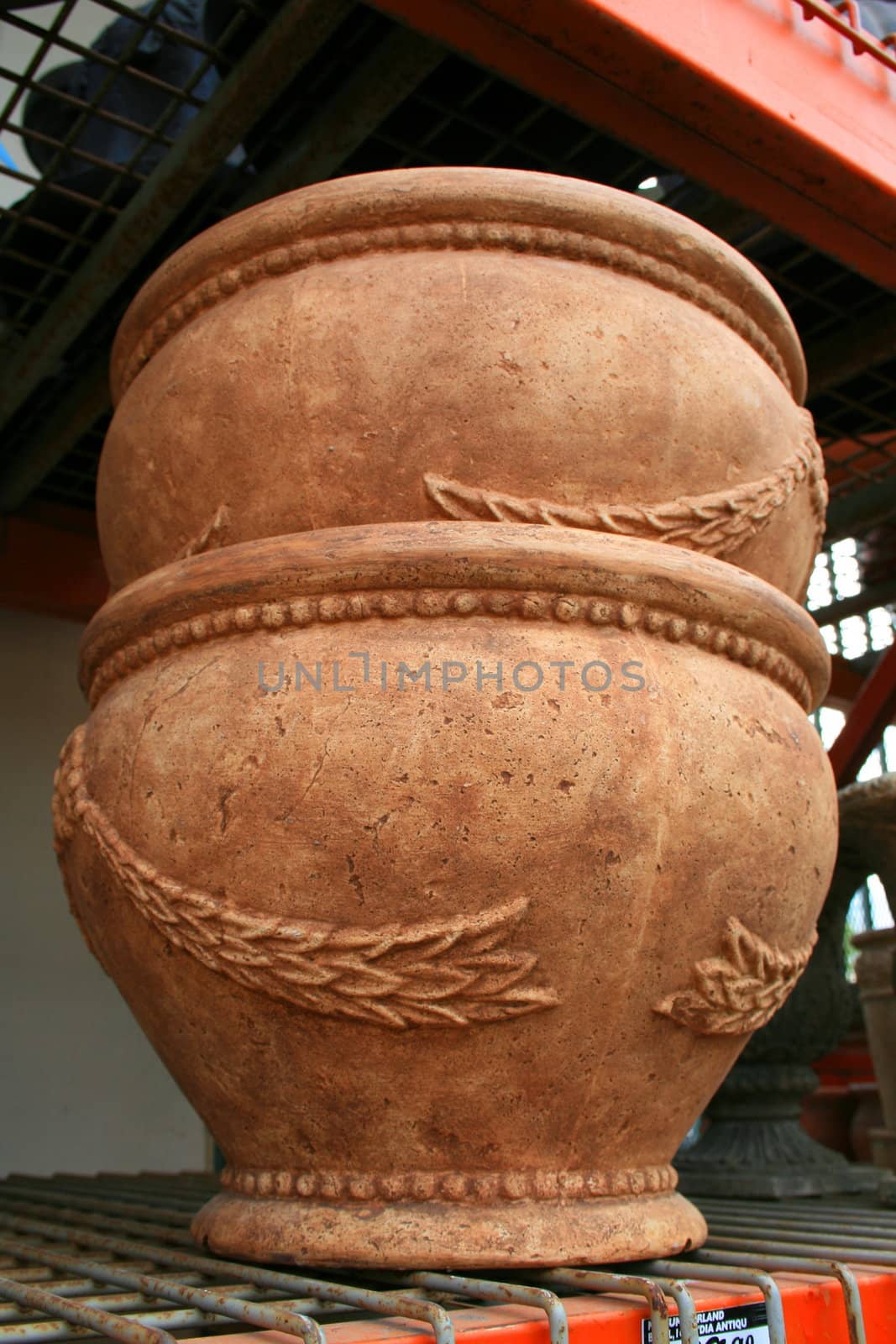 Close up of flower pots with unique design.
