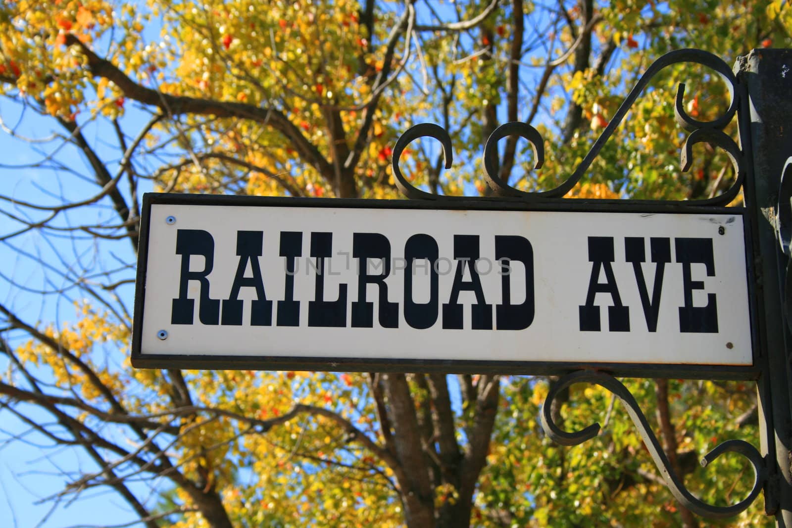 Street sign close up over blue sky.
