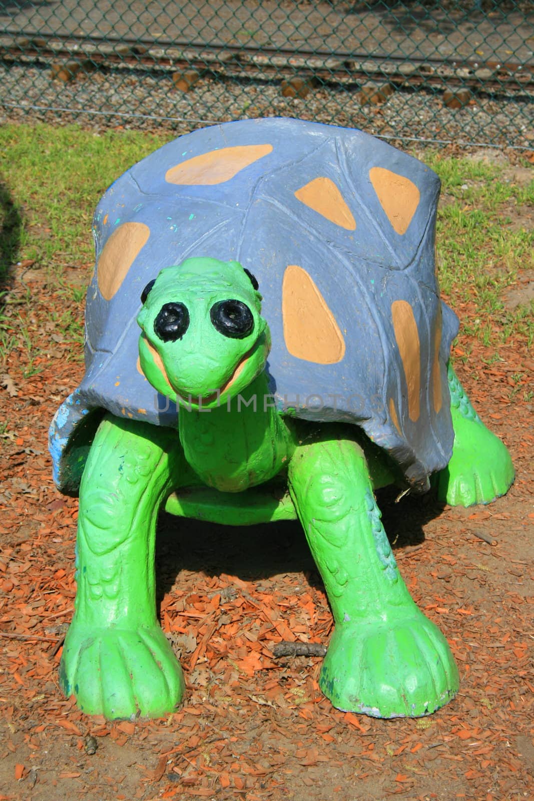 Close up of a turtle child bench.
