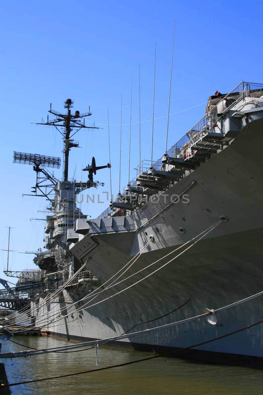 USS Hornet aircraft carrier on a sunny day.
