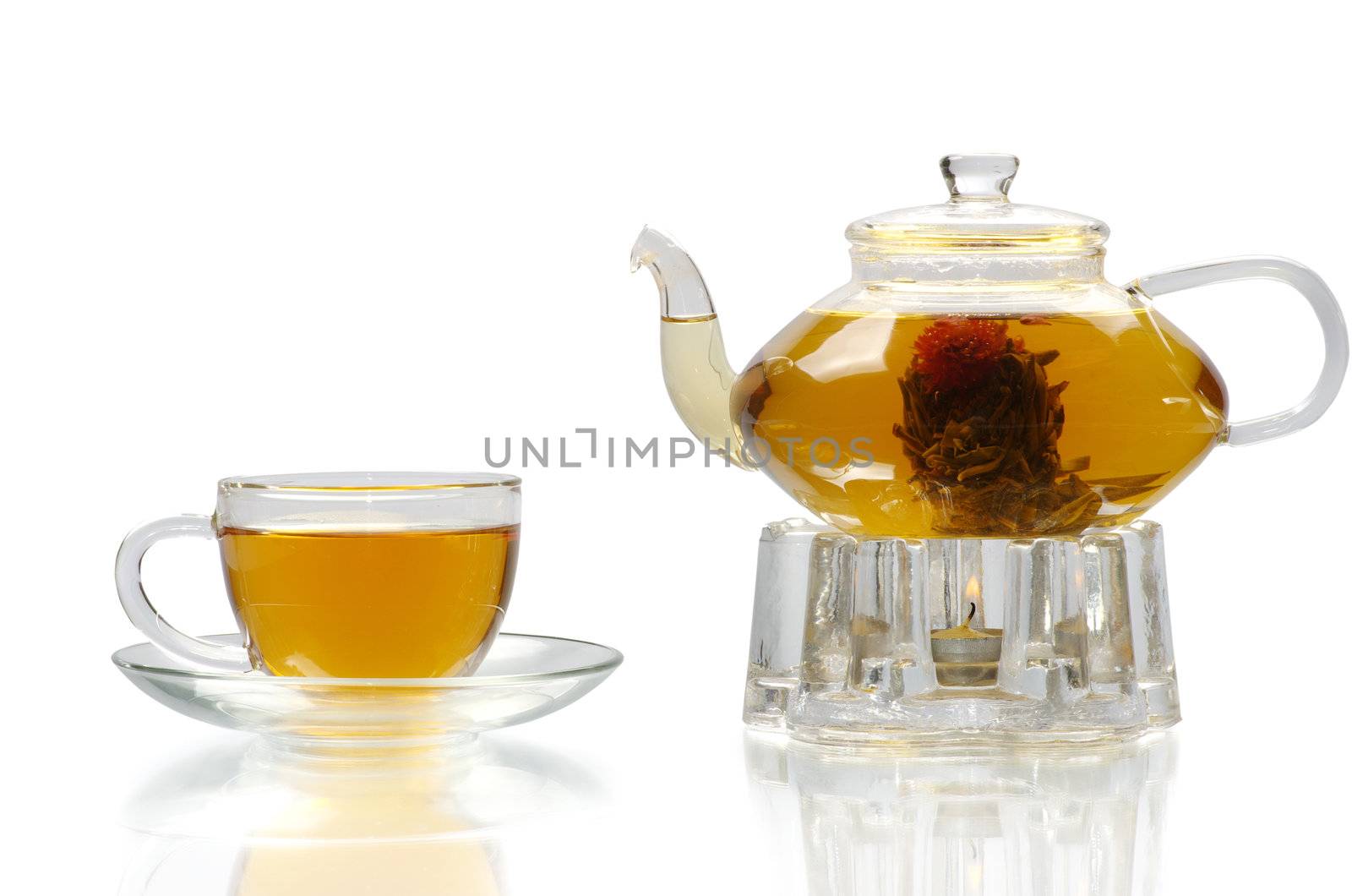 Tea being poured into glass tea cup