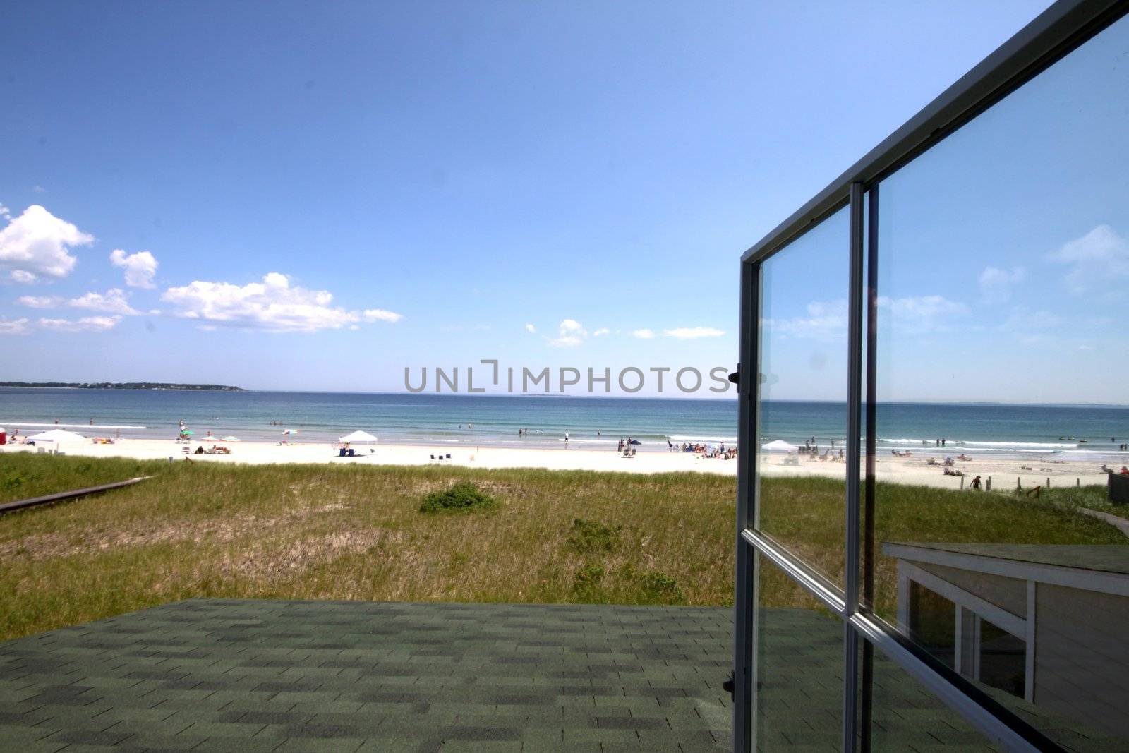 Ocean view from open window in beach front house