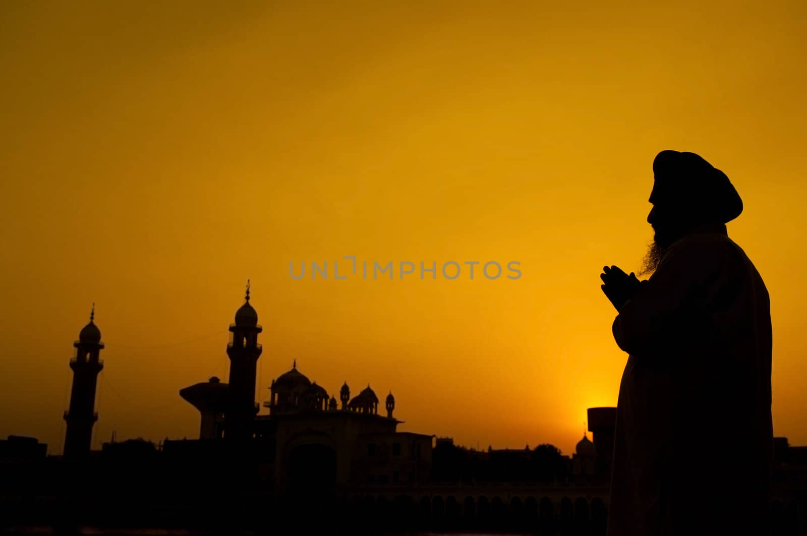 Silhouette of Sikh prayer by szefei