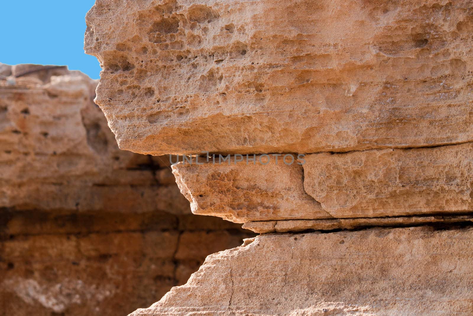 photo texture rocky cliff of sandstone brown