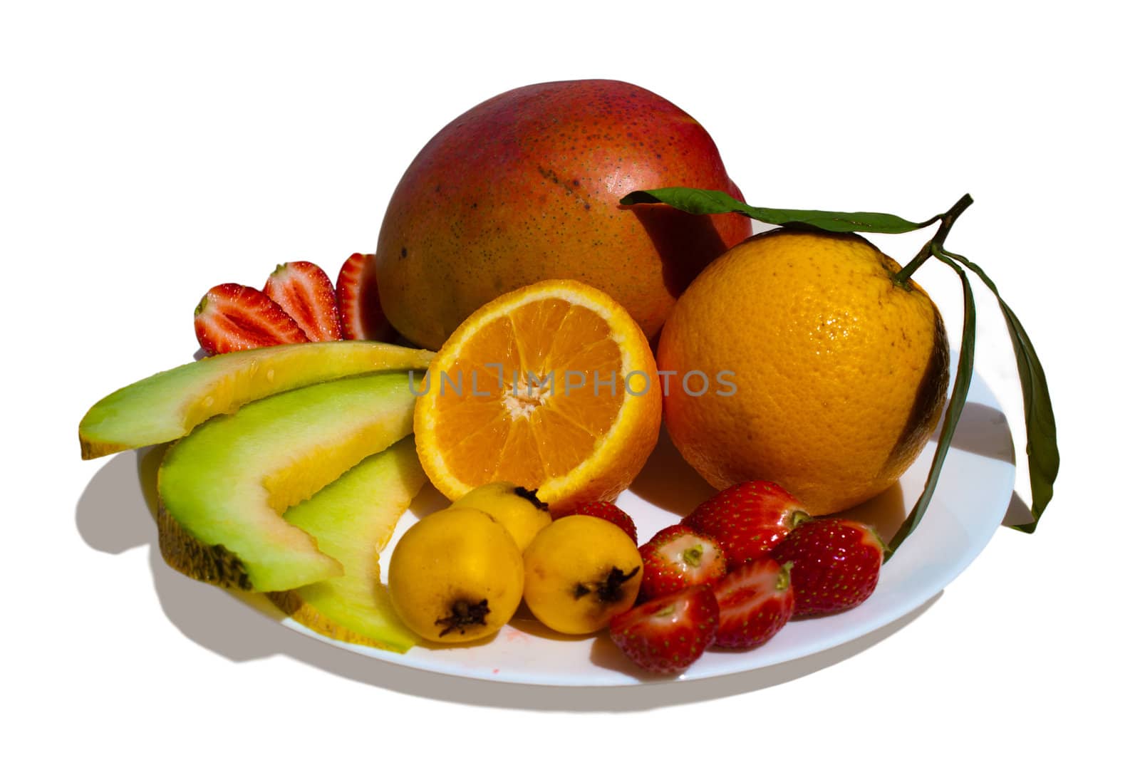 plate of tropical fruits Mangobo, orange, melon