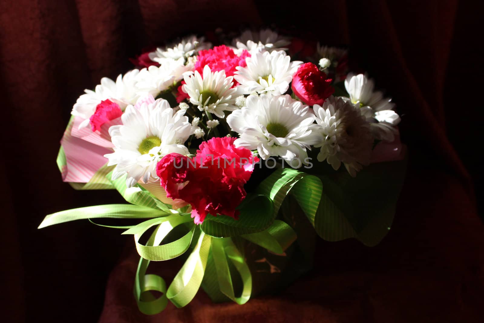 bouquet from white and rose colour on dark background