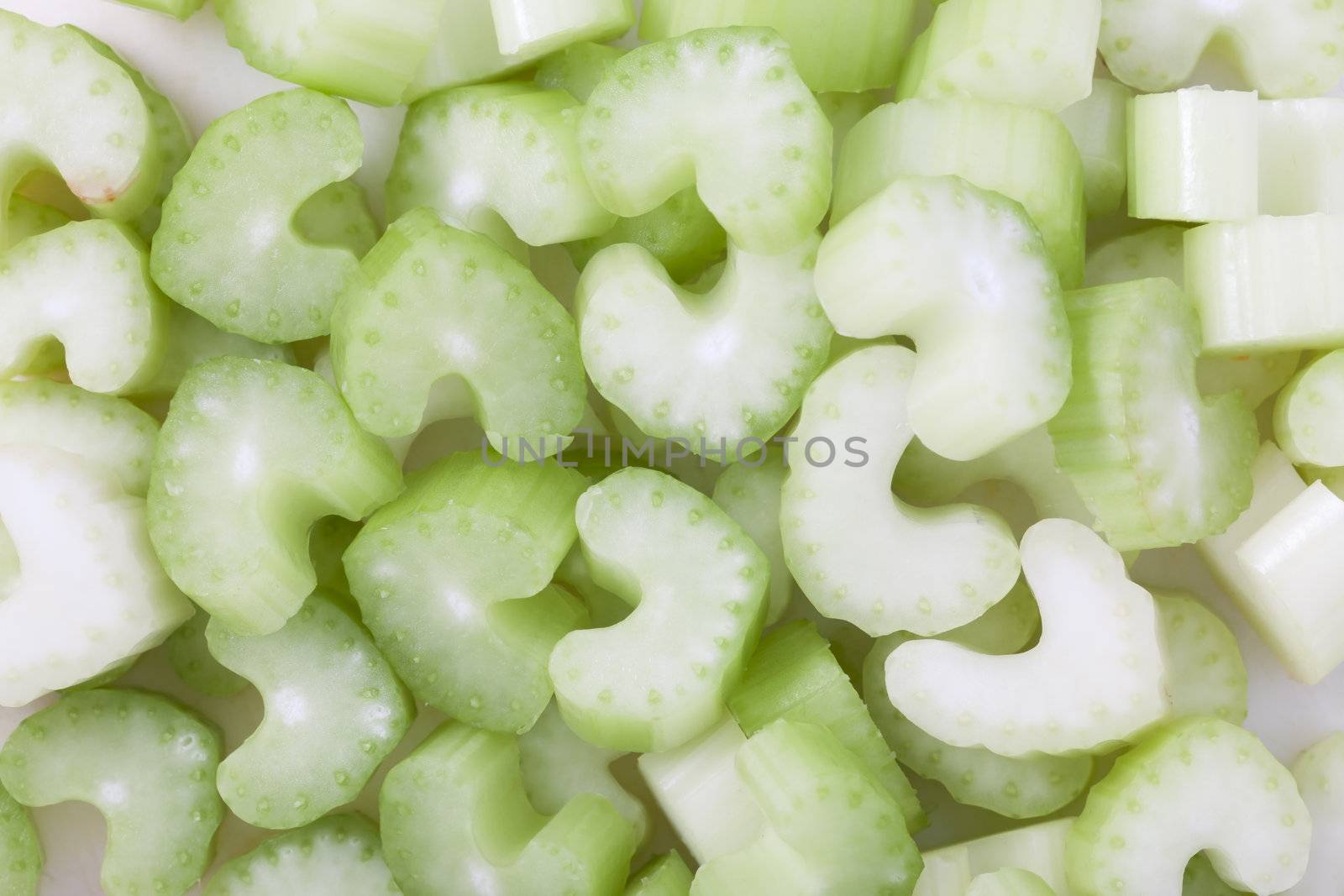 Slices of celery filling frame making food background