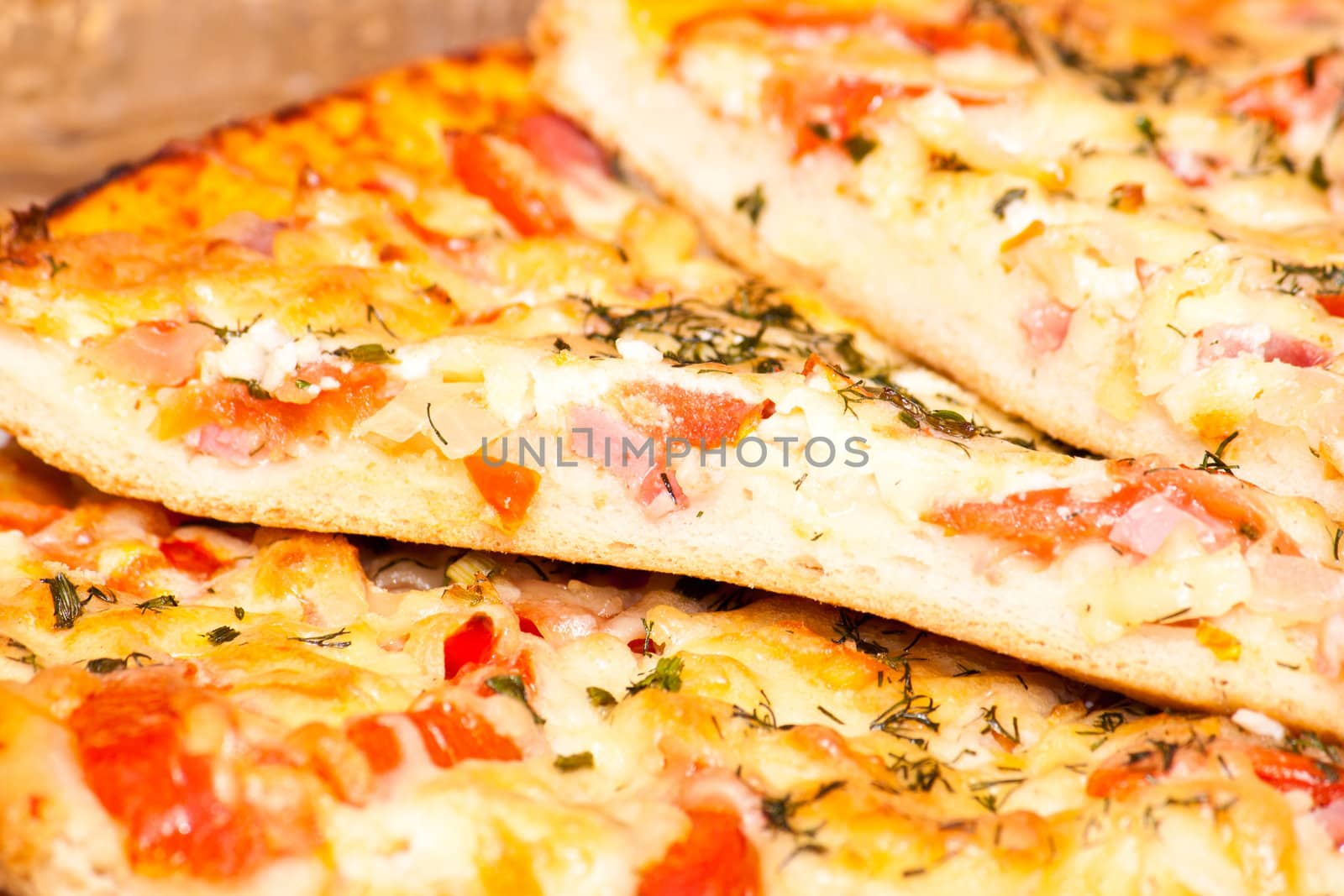 juicy appetizing pizza with tomato and cheese