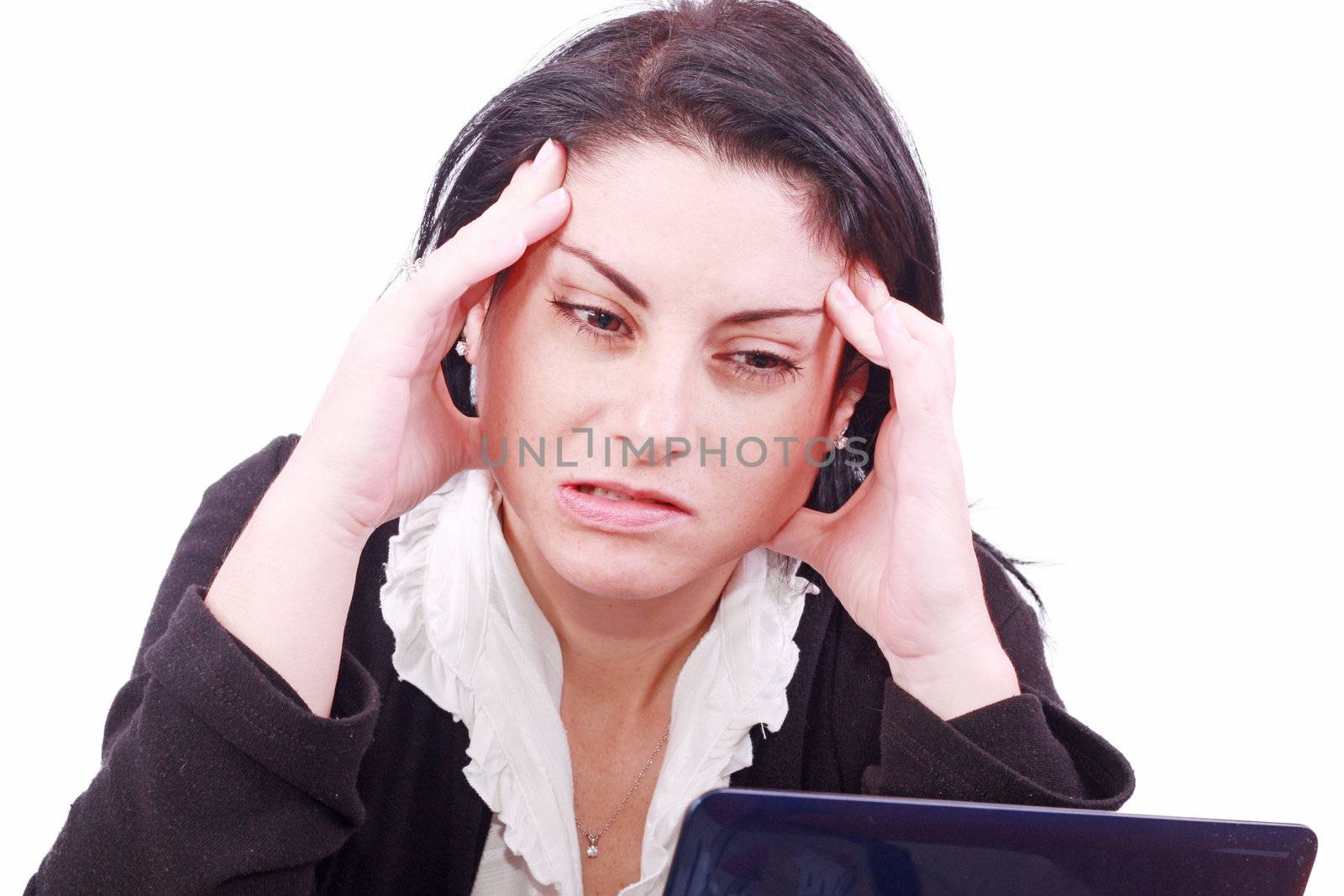 tired young woman in the office at the workplace suffers headach by dacasdo