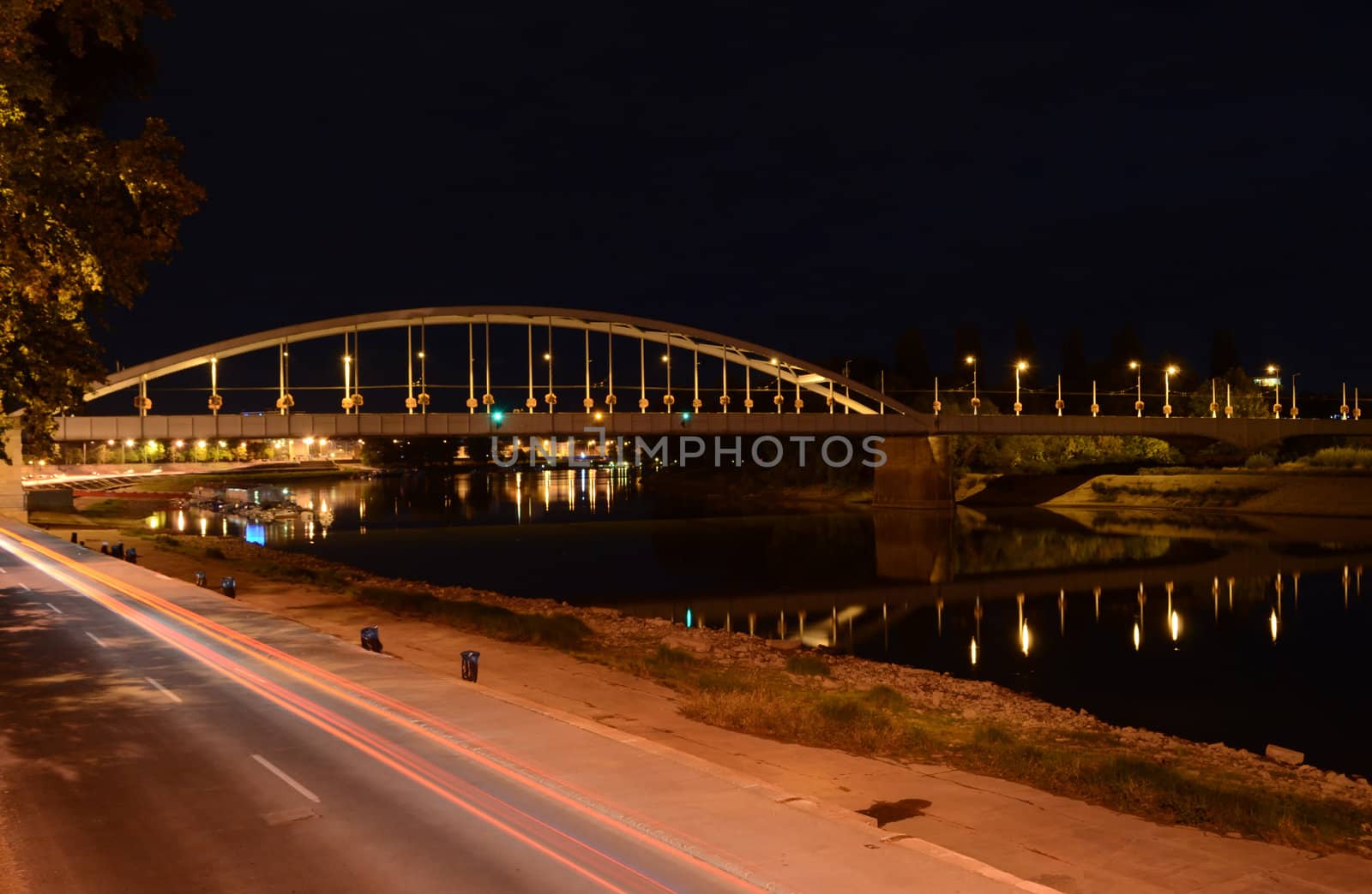 Long exposure night shot of the Belvárosi híd (Downtown Bridge) in Szeged, above the river Tisza.