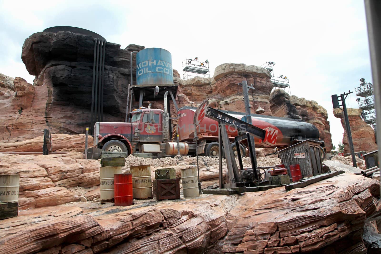 A large truck in the middle of a rocky canyon