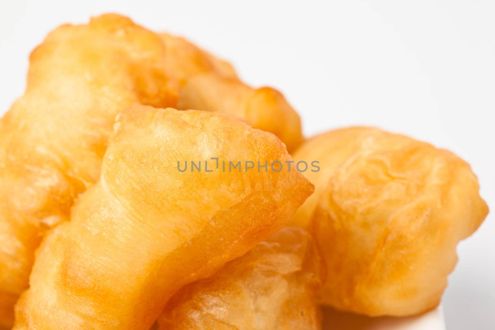 fried bread stick isolated on white background