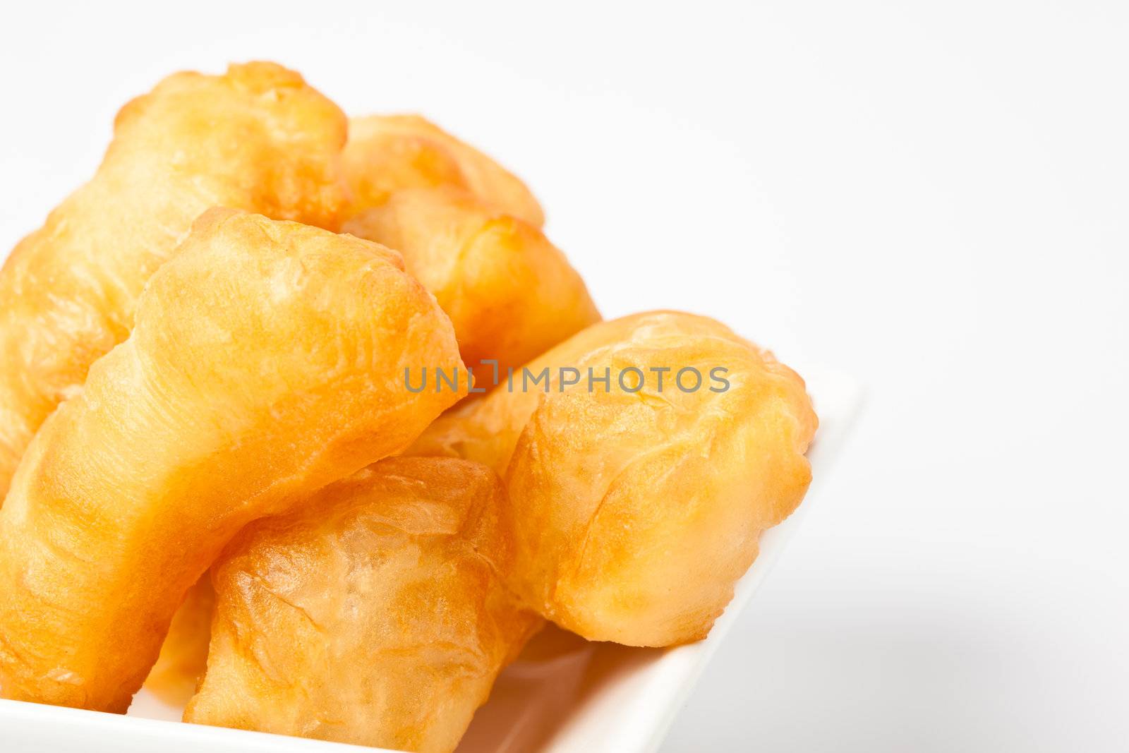 fried bread stick isolated on white background