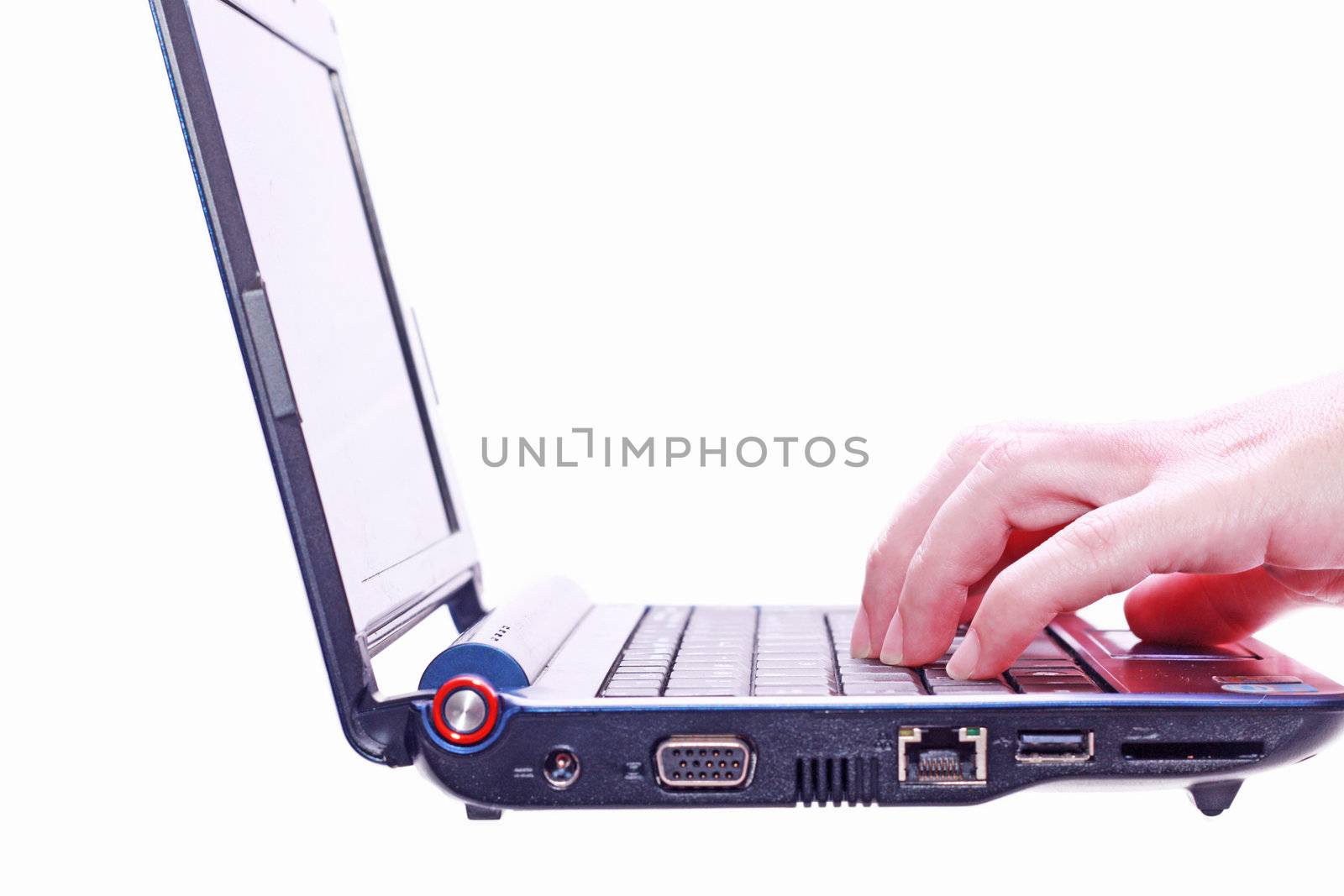 Image of hand on the laptop keyboard. Isolated on white background