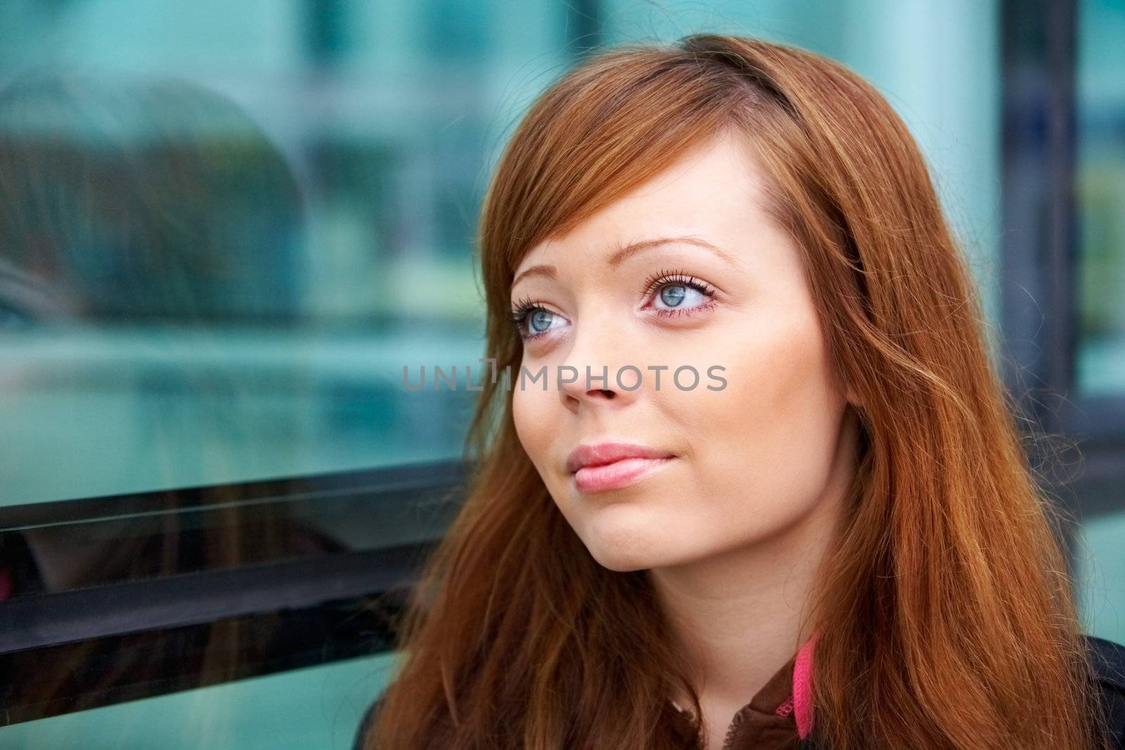 Portrait of teenage girl in outdoor location, looking away