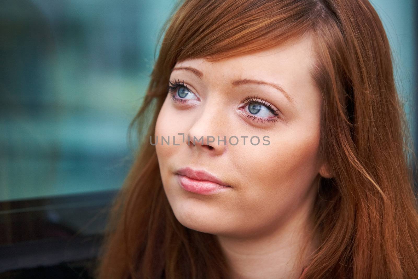 Portrait of teenage girl in outdoor location, close-up