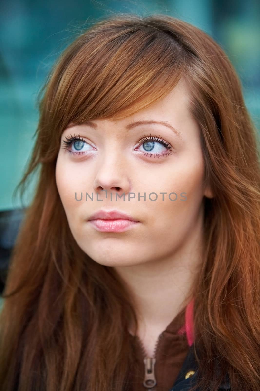 Portrait of teenage girl contemplating in outdoor location