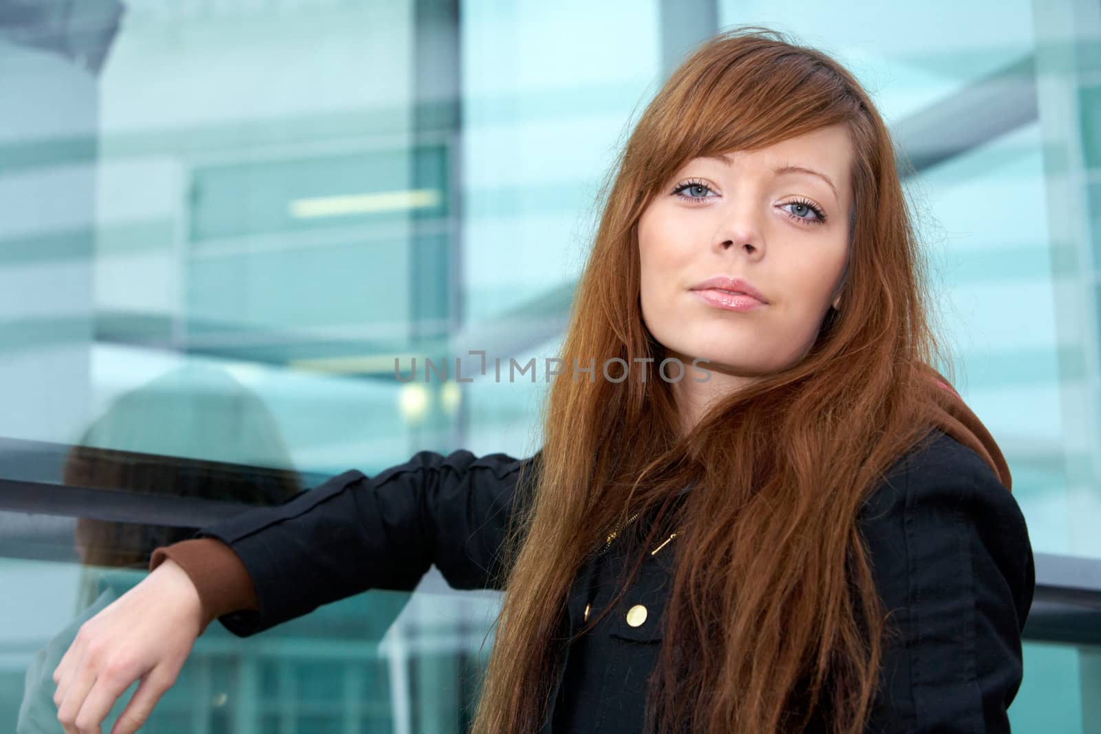 Portrait of teenage girl in outdoor location, low-angle view