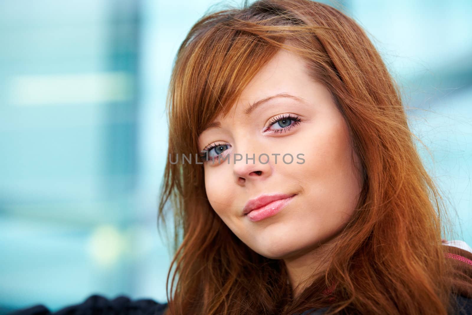 Portrait of teenage girl in outdoor location, smiling