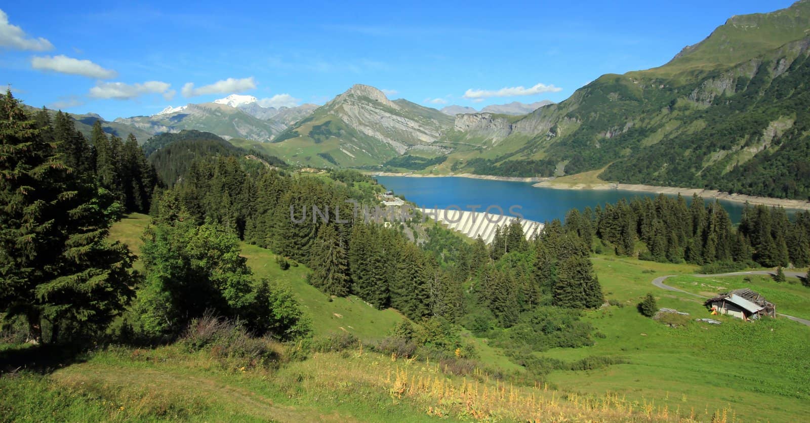 View on Roselend lake and dam in the Alps mountains, France