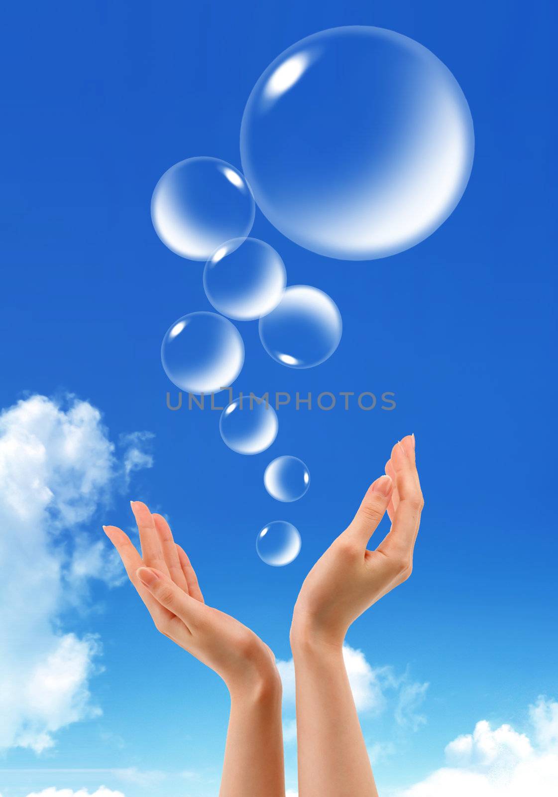 Hand hold Bubbles in the sky
