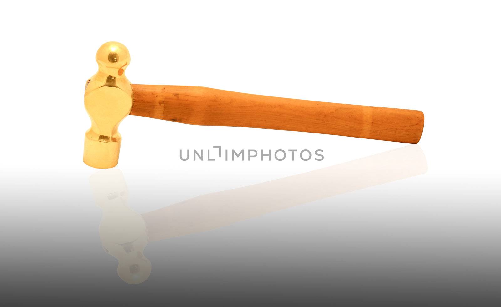 wooden  hammer on an isolated white background