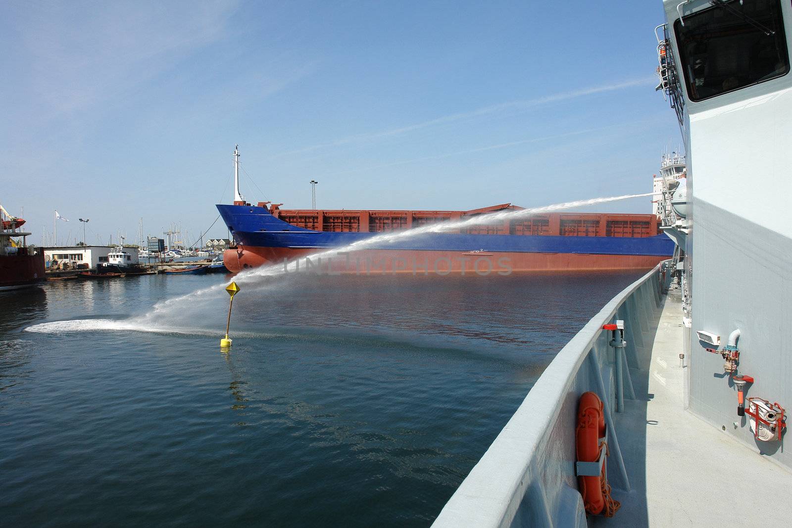  Fire Fighting Boat sprays water jet in a training demonstration show                              