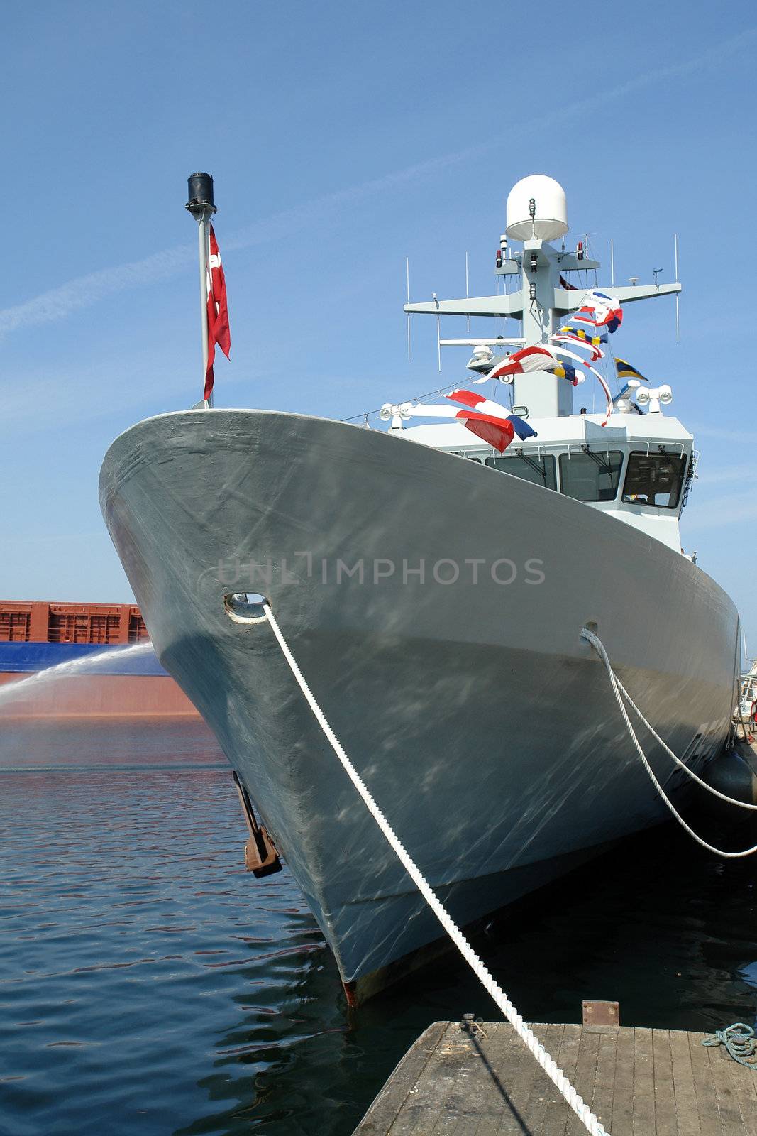 Navy warship frigate anchored in a base port