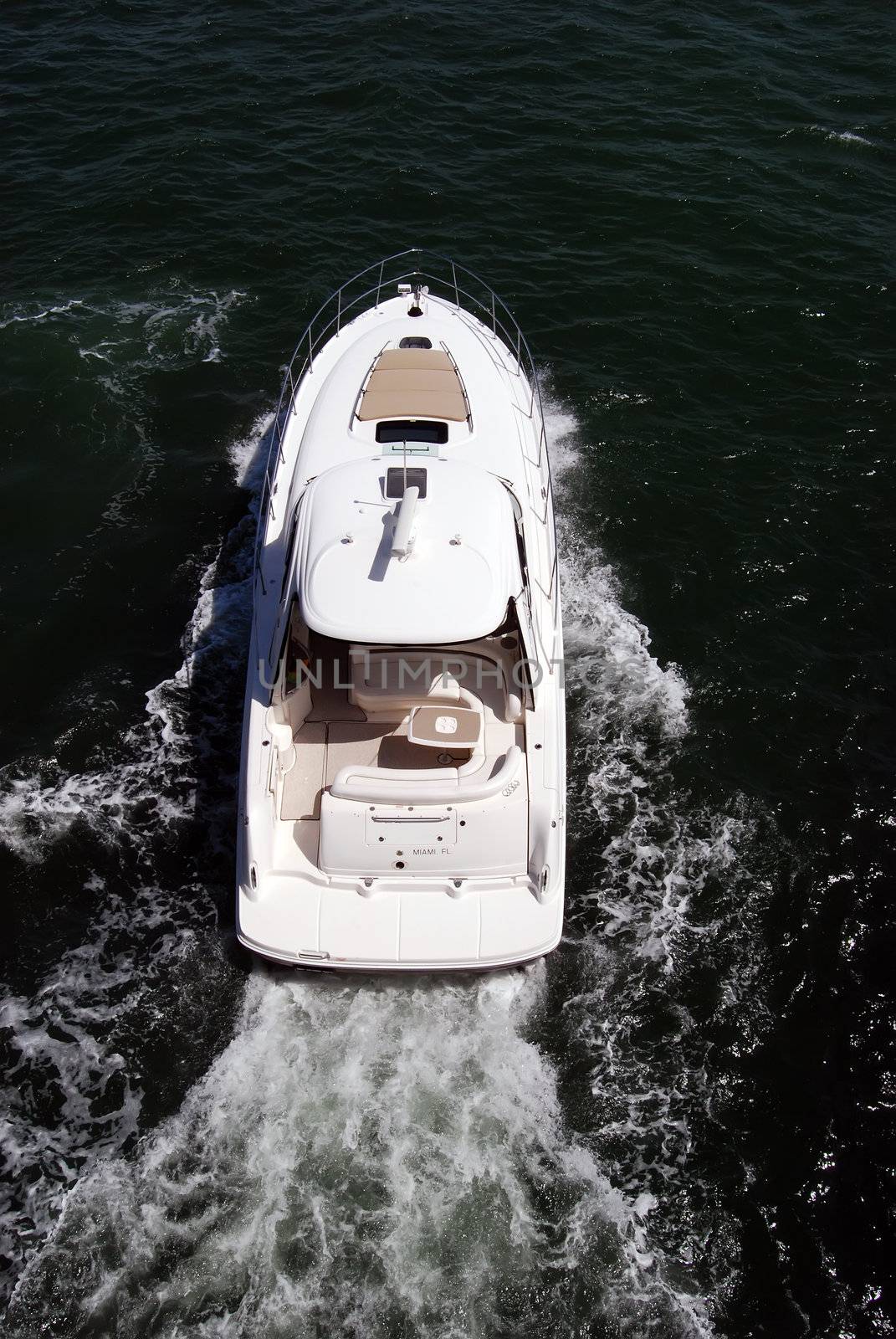 Overhead view of a luxury cabin cruiser on biscayne bay near miami beach,florida