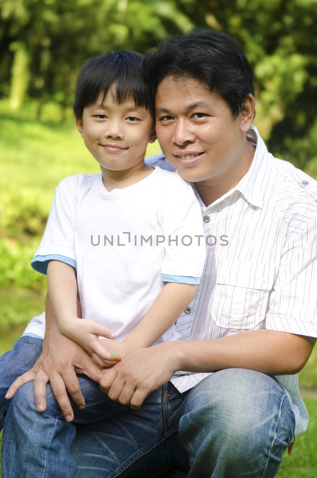 Happy Asian father and son