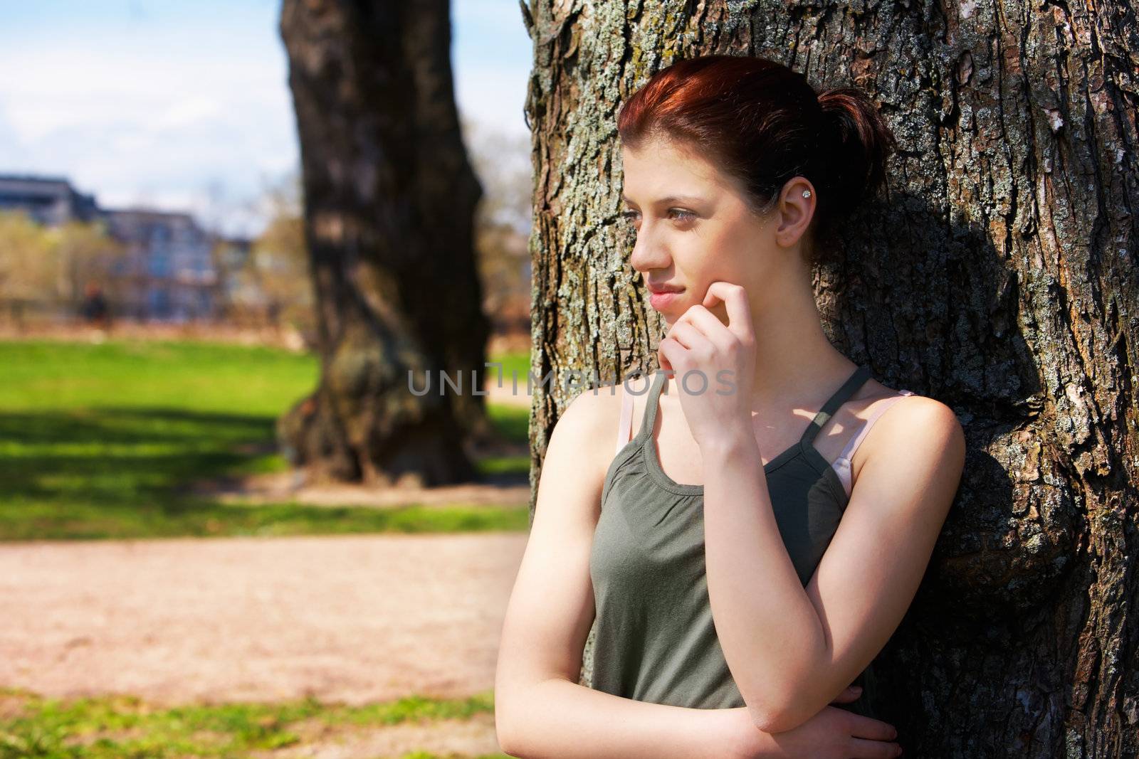 Teenage Girl Leaning to Tree by Luminis
