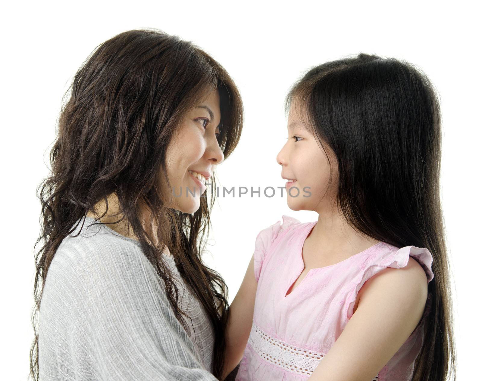 Asian mother and her daughter face to face on white background