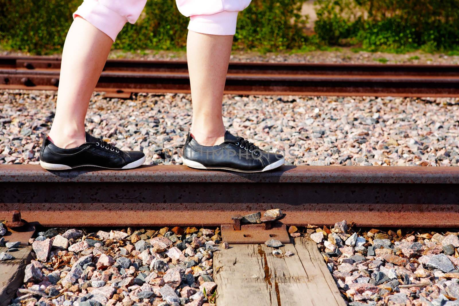 Teenage Girl on Rail by Luminis