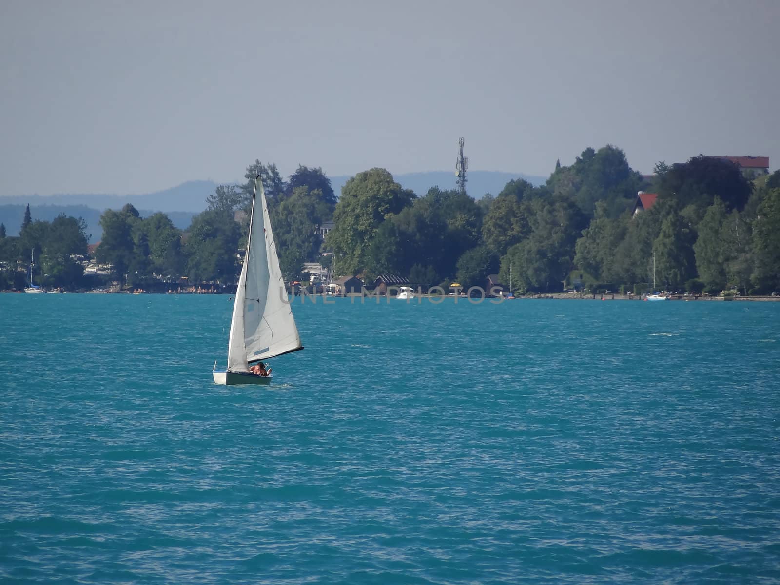 Sailing boat on lake Attersee by Mbatelier