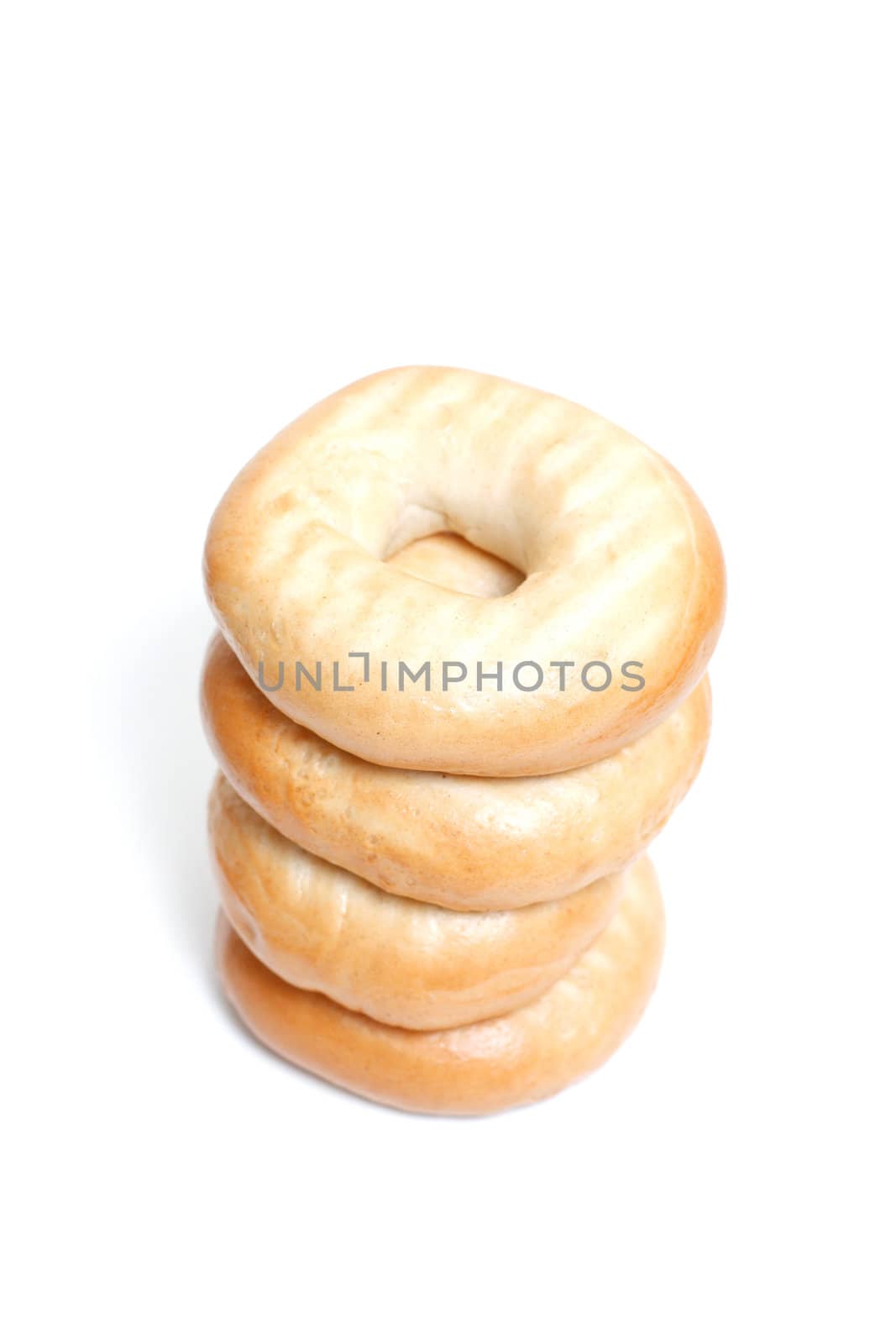Several bagels isolated on white