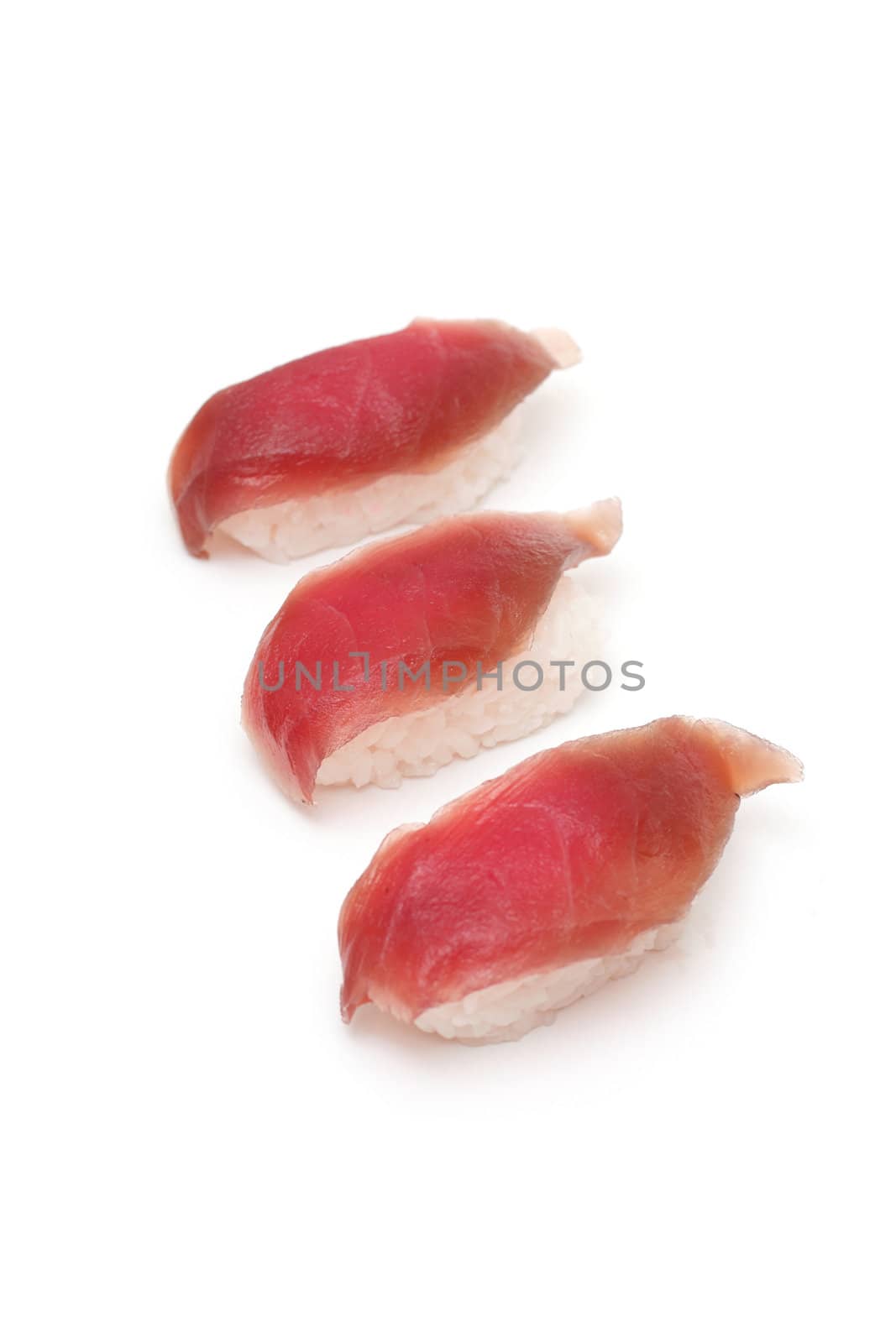 A tuna nigiri isolated on white