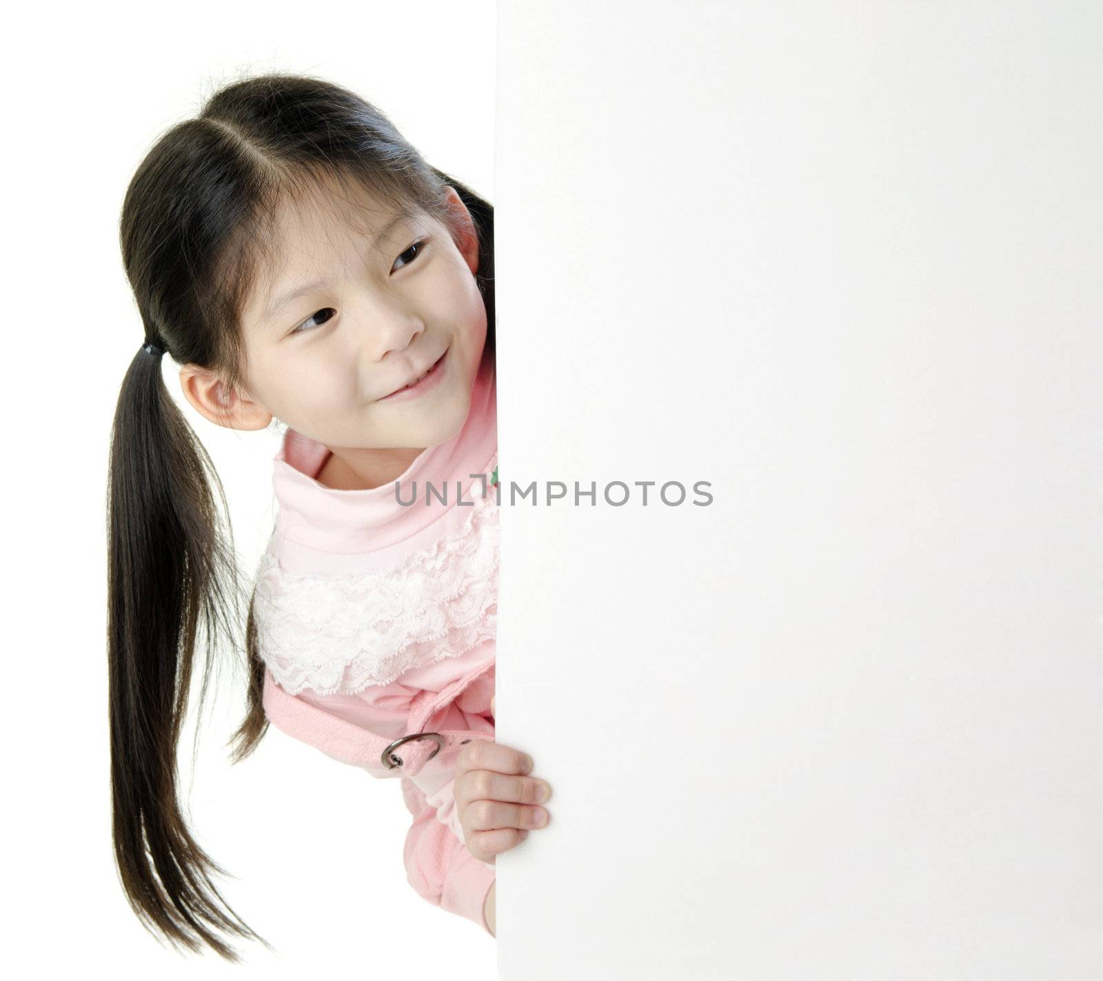 Young Asian girl holding a blank white card.