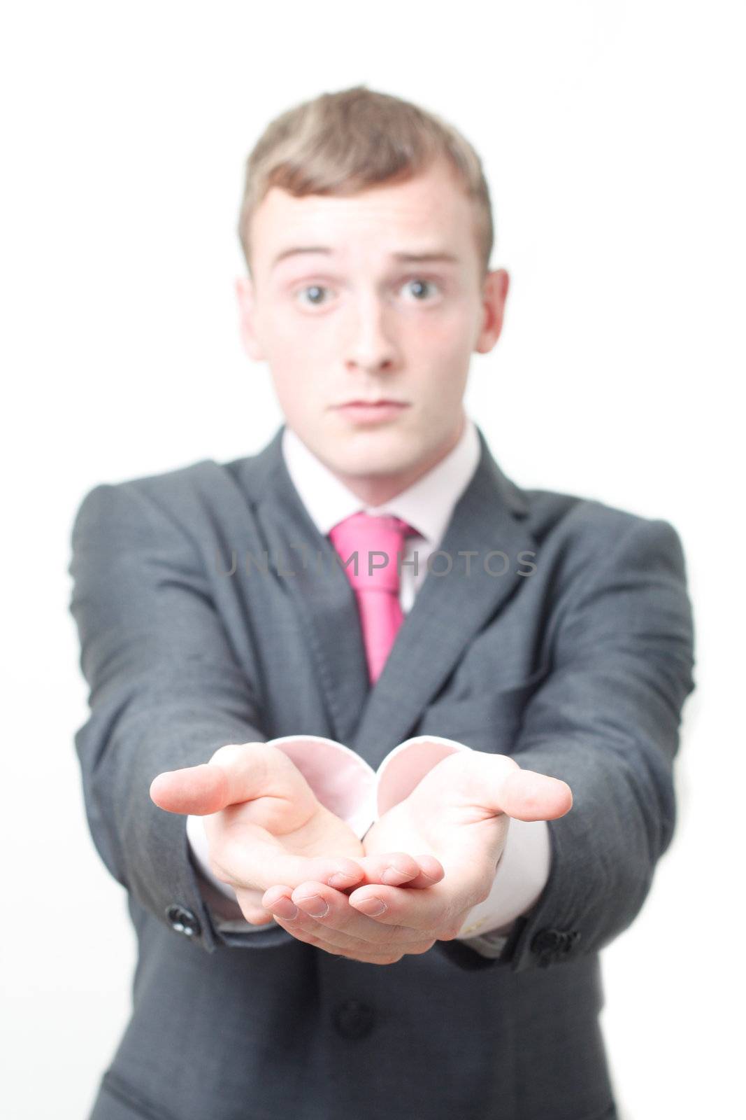 A business man begging for money on white